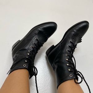 Black combat riding boots